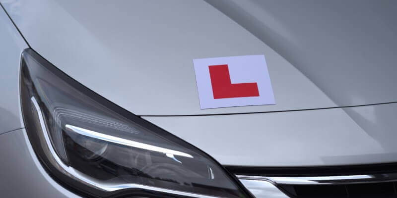 Learner sign stuck to a car bonnet
