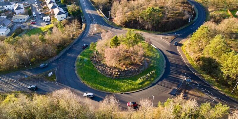 Aerial view of cars using a roundabout