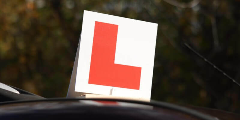 Learner sign on top of car